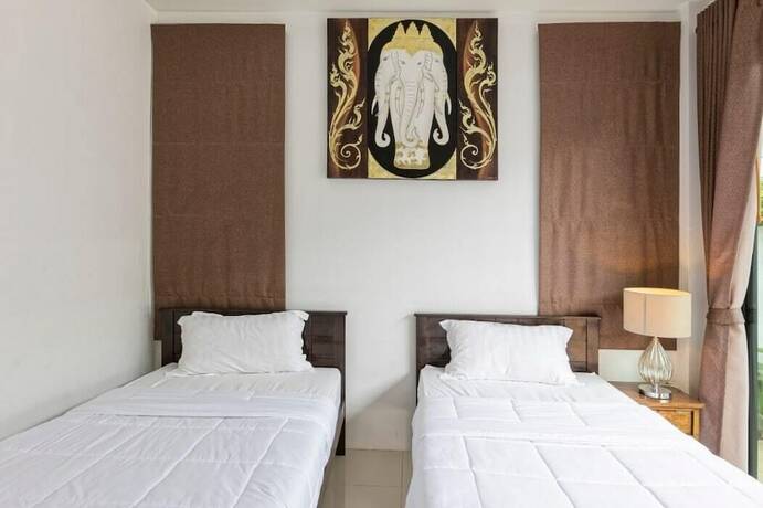Imagen de la habitación del Hotel Sanga Villas. Foto 19