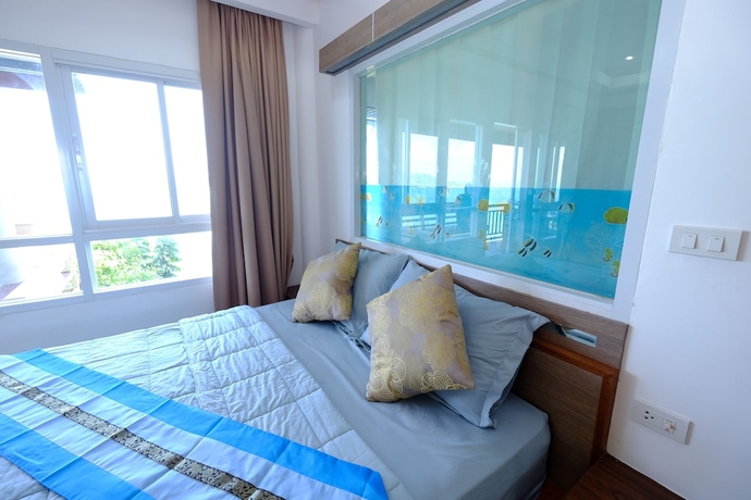 Imagen de la habitación del Hotel Sanggaou Bungalows. Foto 9