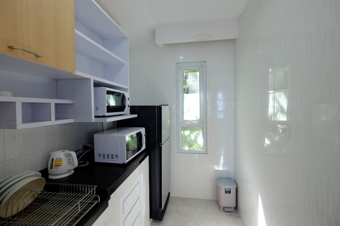 Imagen de la habitación del Hotel Sanggaou Bungalows. Foto 10