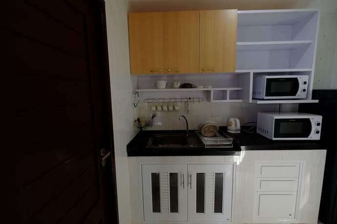 Imagen de la habitación del Hotel Sanggaou Bungalows. Foto 11