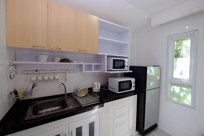 Imagen de la habitación del Hotel Sanggaou Bungalows. Foto 12