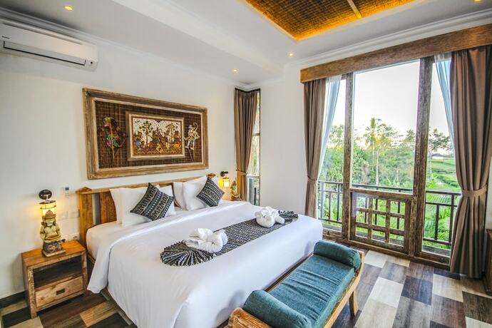 Imagen de la habitación del Hotel Sanggraloka Suite. Foto 2