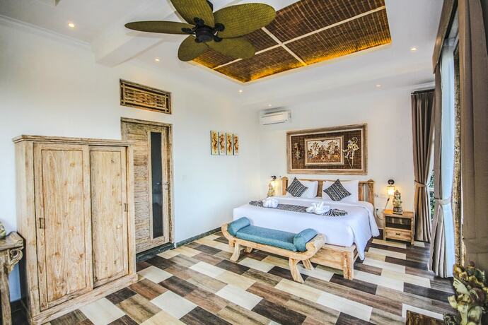 Imagen de la habitación del Hotel Sanggraloka Suite. Foto 8