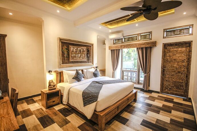 Imagen de la habitación del Hotel Sanggraloka Suite. Foto 11