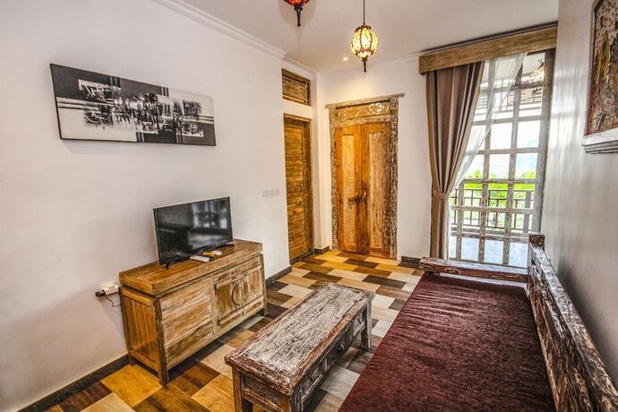 Imagen de la habitación del Hotel Sanggraloka Suite. Foto 13