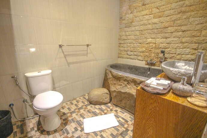 Imagen de la habitación del Hotel Sanggraloka Suite. Foto 14