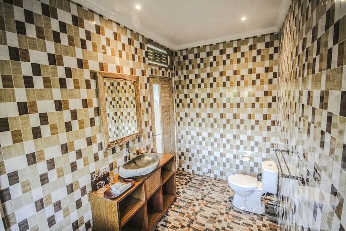 Imagen de la habitación del Hotel Sanggraloka Suite. Foto 15