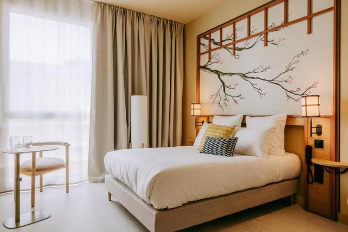 Imagen de la habitación del Hotel Sangha Toulouse. Foto 7