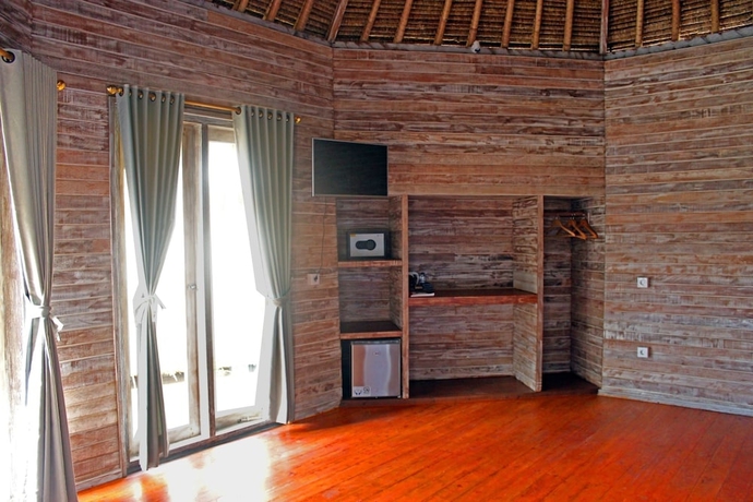 Imagen de la habitación del Hotel Sanghyang Bay Villas. Foto 11