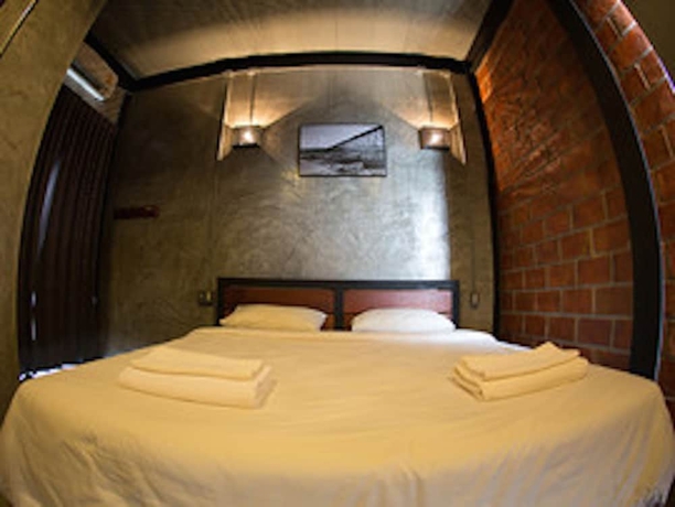 Imagen de la habitación del Hotel Sangkhlakiri Resort. Foto 5