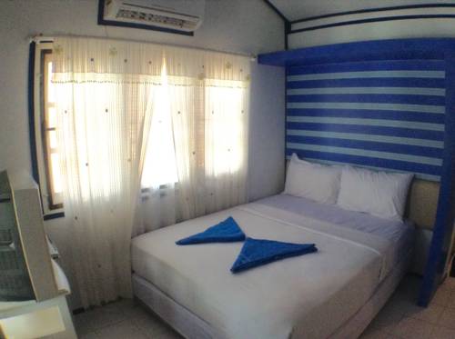 Imagen de la habitación del Hotel Sangthian Beach Resort. Foto 9