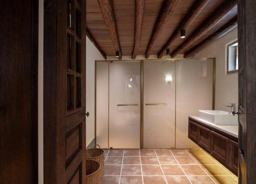 Imagen de la habitación del Hotel Sanhe Daoli Resort. Foto 16