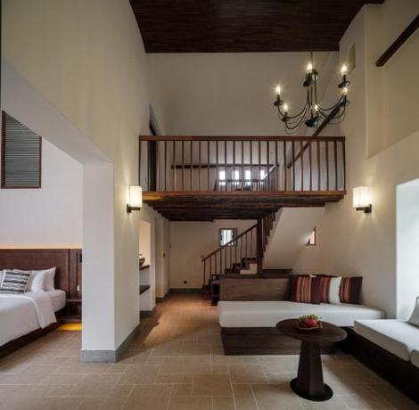 Imagen de la habitación del Hotel Sanhe Daoli Resort. Foto 17