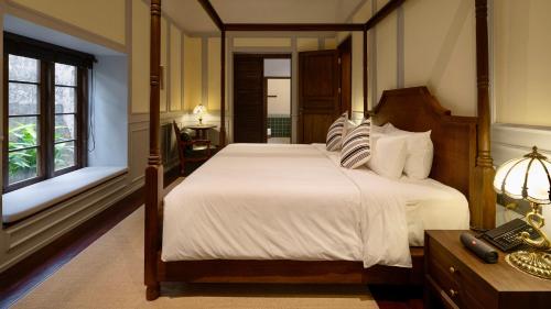 Imagen de la habitación del Hotel Sanhe Daoli Resort. Foto 18