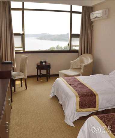 Imagen de la habitación del Hotel Sanhu Lake Holiday Hotel Xianning. Foto 14