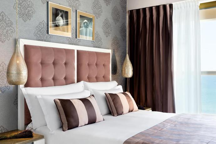 Imagen de la habitación del Hotel Sani Beach. Foto 17