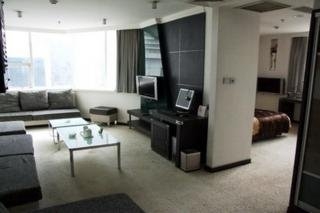 Imagen de la habitación del Hotel Sanjiang Business. Foto 1