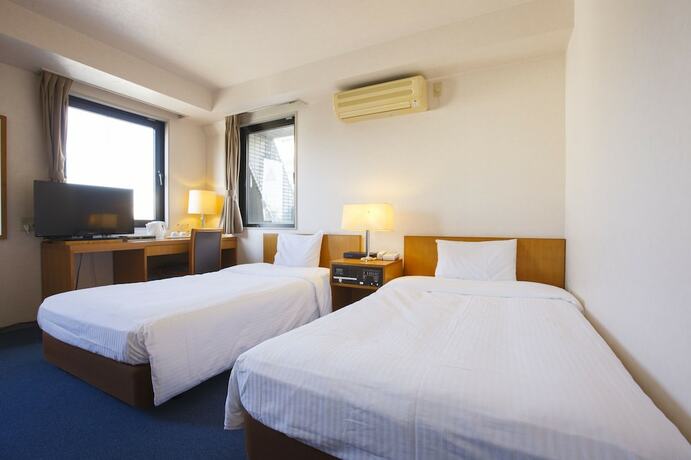 Imagen de la habitación del Hotel Sankei City Hachiouji. Foto 23