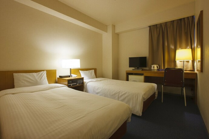 Imagen de la habitación del Hotel Sankei City Hachiouji. Foto 24