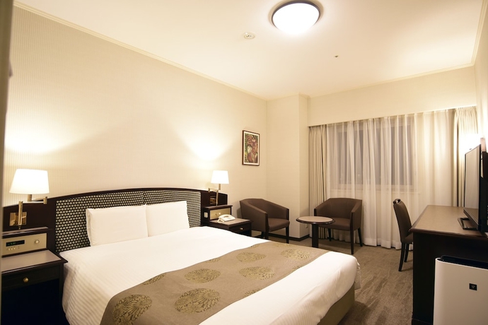 Imagen de la habitación del Hotel Sankyo Fukushima. Foto 13