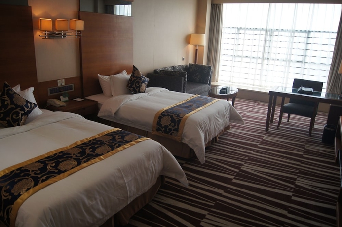 Imagen de la habitación del Hotel Sanlian. Foto 10