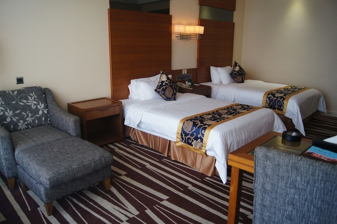 Imagen de la habitación del Hotel Sanlian. Foto 12