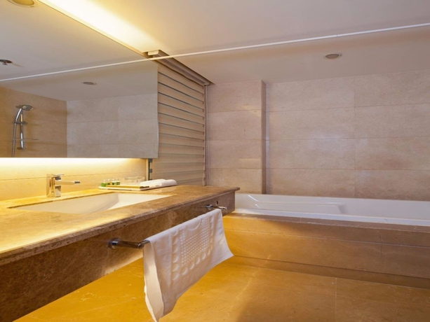 Imagen de la habitación del Hotel Sanlitun Xin Xiang Ya Yuan Apartment. Foto 9