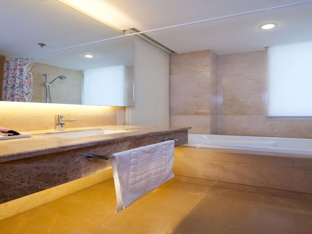 Imagen de la habitación del Hotel Sanlitun Xin Xiang Ya Yuan Apartment. Foto 10