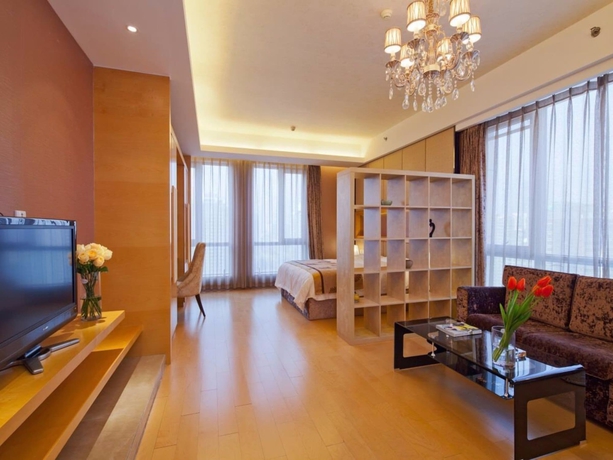 Imagen de la habitación del Hotel Sanlitun Xin Xiang Ya Yuan Apartment. Foto 12