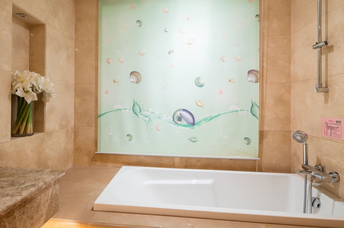 Imagen de la habitación del Hotel Sanlitun Xin Xiang Ya Yuan Apartment. Foto 18