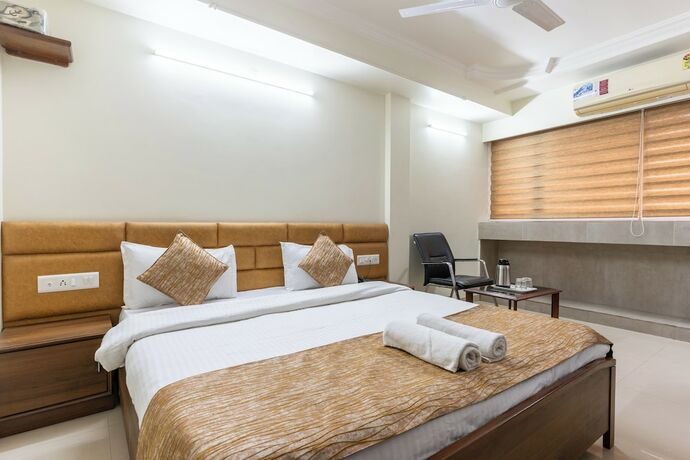 Imagen de la habitación del Hotel Sanmati, Ahmedabad. Foto 13