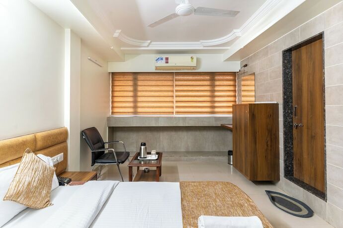 Imagen de la habitación del Hotel Sanmati, Ahmedabad. Foto 14