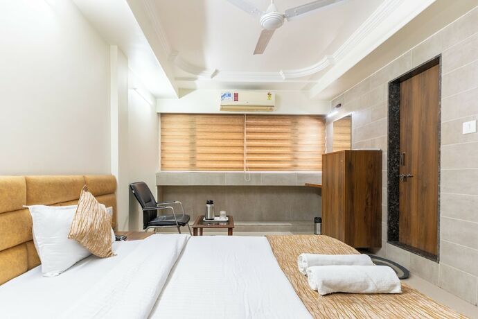 Imagen de la habitación del Hotel Sanmati, Ahmedabad. Foto 15