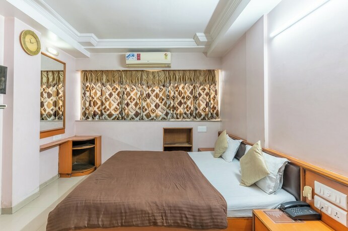 Imagen de la habitación del Hotel Sanmati, Ahmedabad. Foto 16