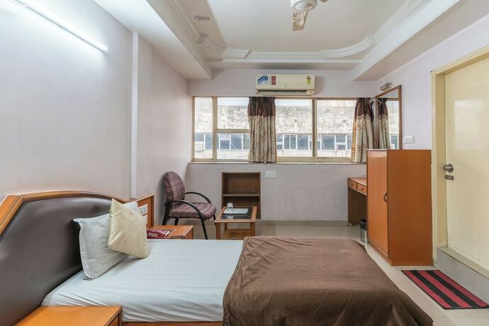 Imagen de la habitación del Hotel Sanmati, Ahmedabad. Foto 17
