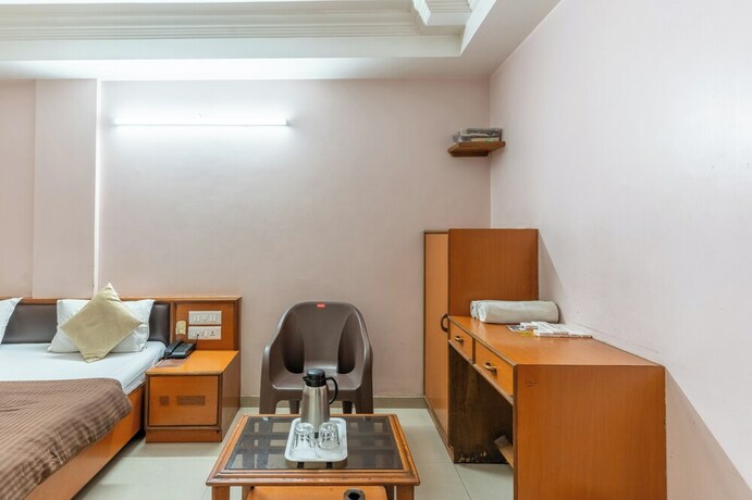 Imagen de la habitación del Hotel Sanmati, Ahmedabad. Foto 18