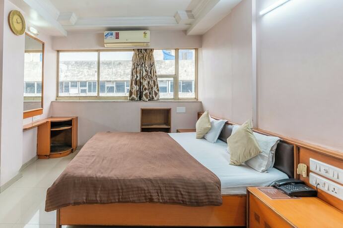 Imagen de la habitación del Hotel Sanmati, Ahmedabad. Foto 19