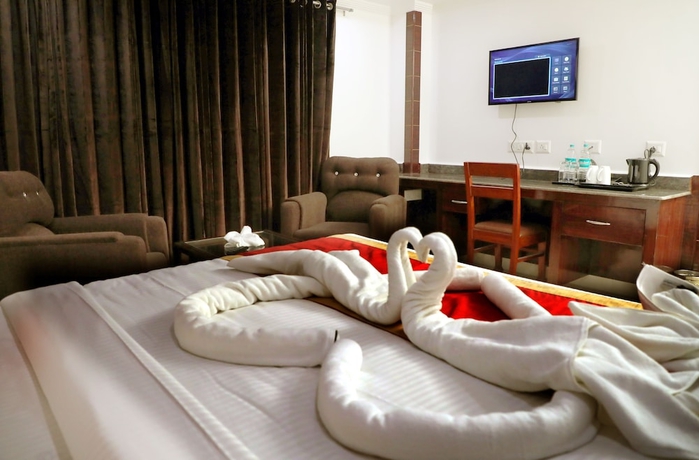 Imagen de la habitación del Hotel Sanobar The Grand White. Foto 10