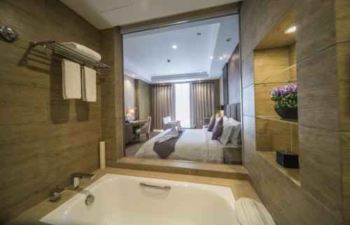 Imagen de la habitación del Hotel Sanqingshan New Century Resort. Foto 6