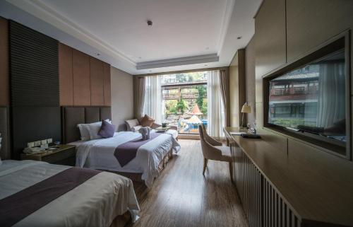 Imagen de la habitación del Hotel Sanqingshan New Century Resort. Foto 7