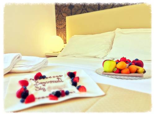 Imagen de la habitación del Hotel Sanremo Luxury Suites. Foto 2