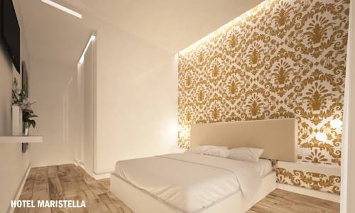 Imagen de la habitación del Hotel Sanremo Luxury Suites. Foto 3