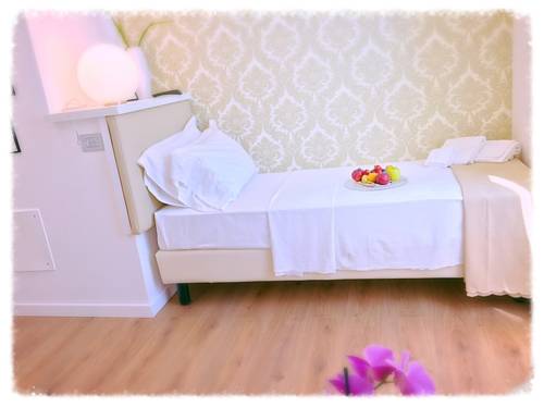 Imagen de la habitación del Hotel Sanremo Luxury Suites. Foto 6