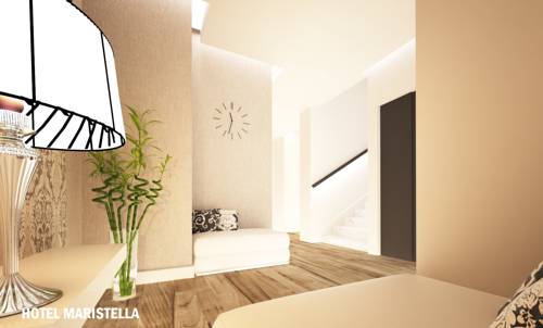 Imagen de la habitación del Hotel Sanremo Luxury Suites. Foto 11