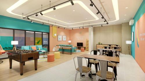 Imagen de la habitación del Hotel Sans Bougenville Lampung. Foto 10