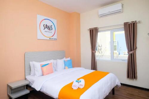 Imagen de la habitación del Hotel Sans City Park Medoho Semarang. Foto 20