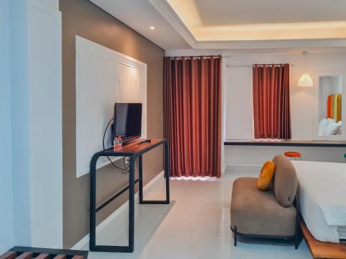 Imagen de la habitación del Hotel Sans Grand Sabaraya Cikampek. Foto 18
