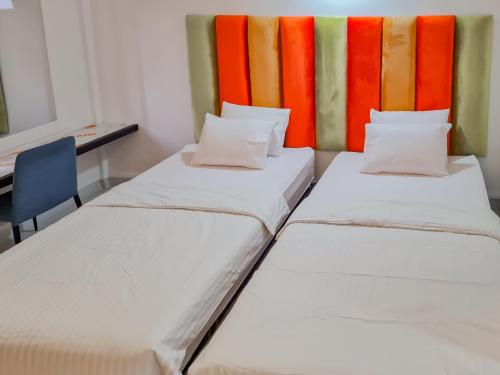 Imagen de la habitación del Hotel Sans Grand Sabaraya Cikampek. Foto 20