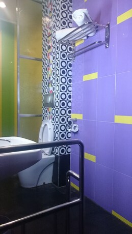 Imagen de la habitación del Hotel Sans Hotel International Surabaya. Foto 6