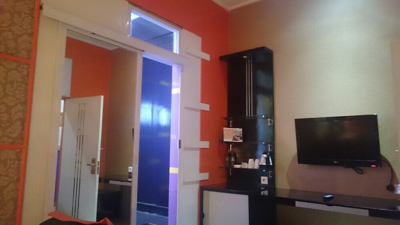 Imagen de la habitación del Hotel Sans Hotel International Surabaya. Foto 7